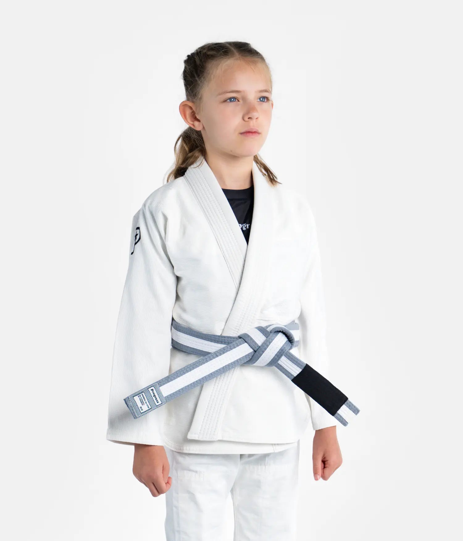 Kimono Brazilian Jiu Jitsu PROGRESS Copii
Asezat pe un model
Poza facuta din stanga